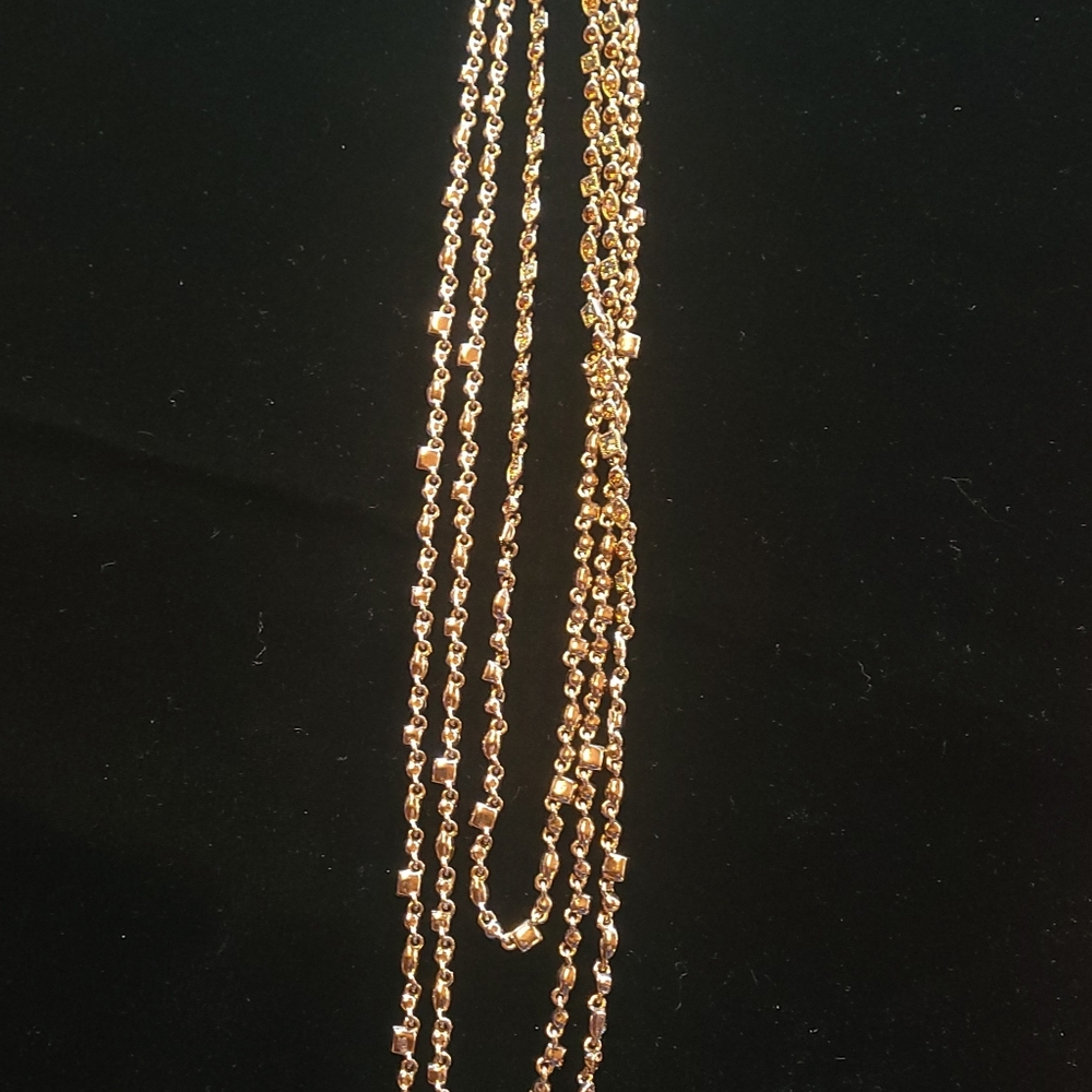 Three strand Rhinestone necklace .
